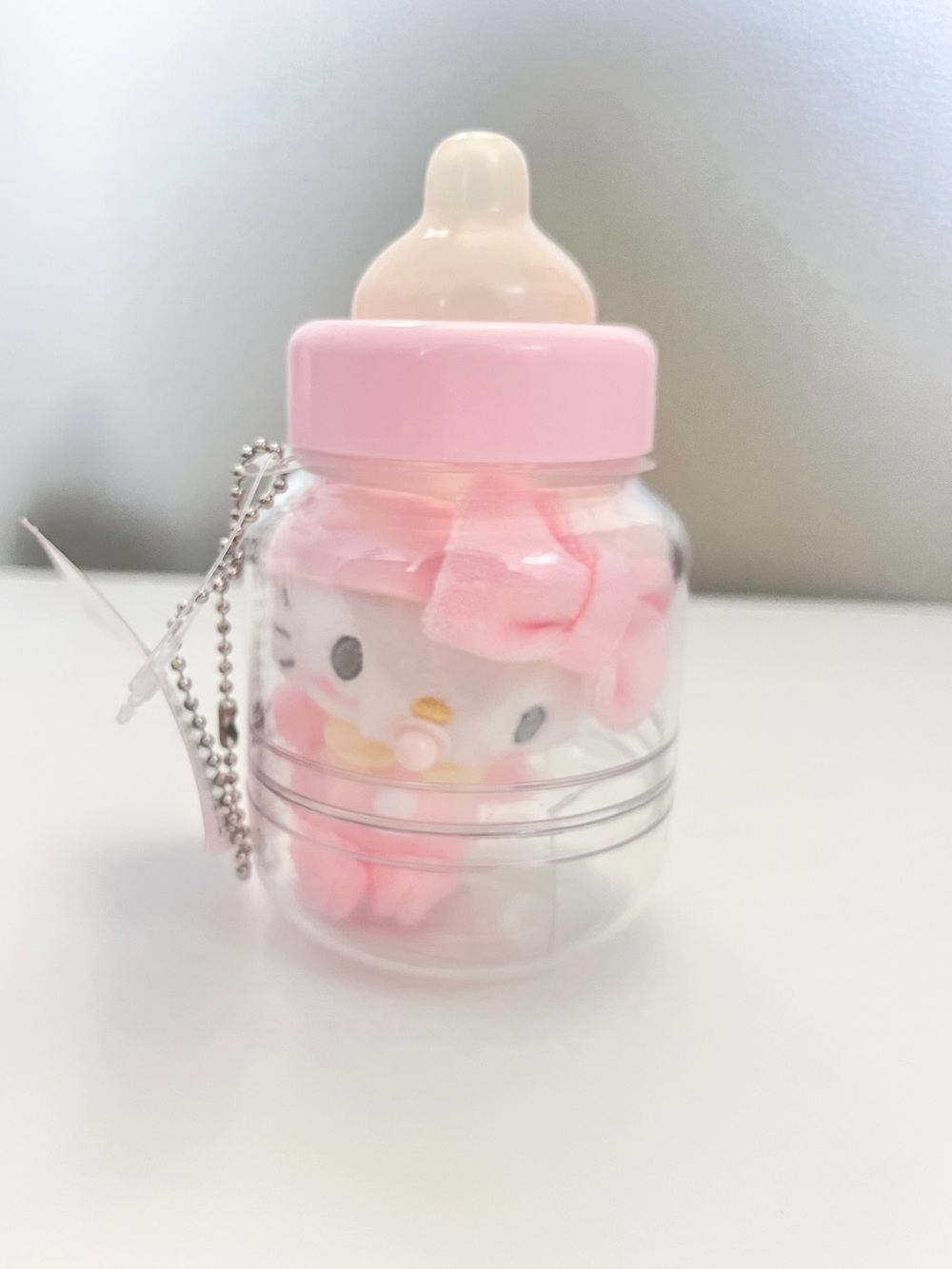 Sanrio Hello Kitty Mascot Holder Stardust Baby Bottle Pink & White